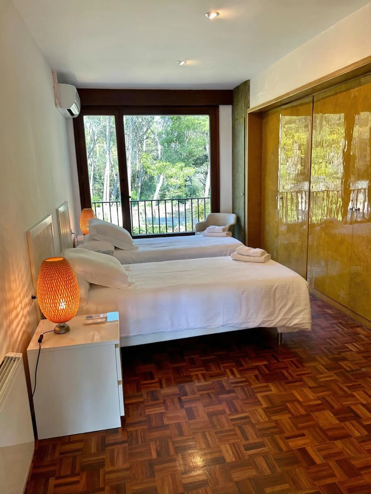 Bedroom with balcony garden view