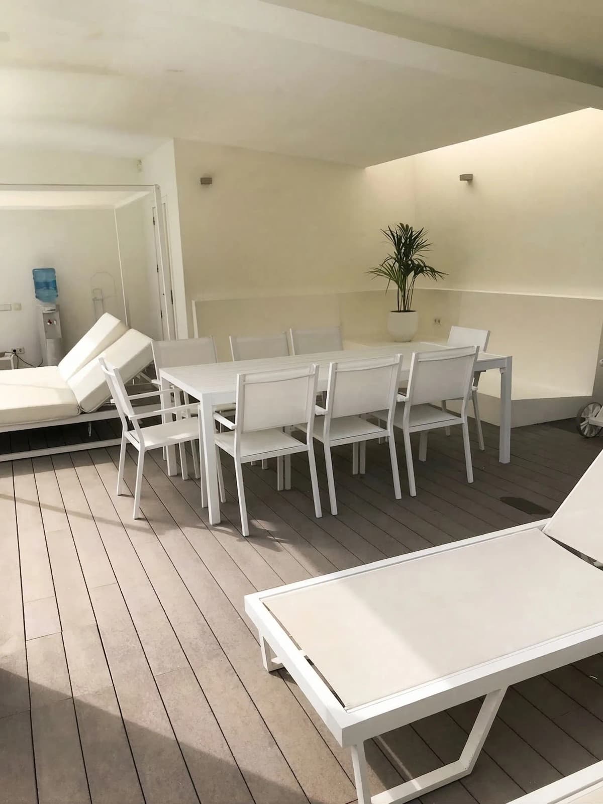 White outdoor terrace dining area