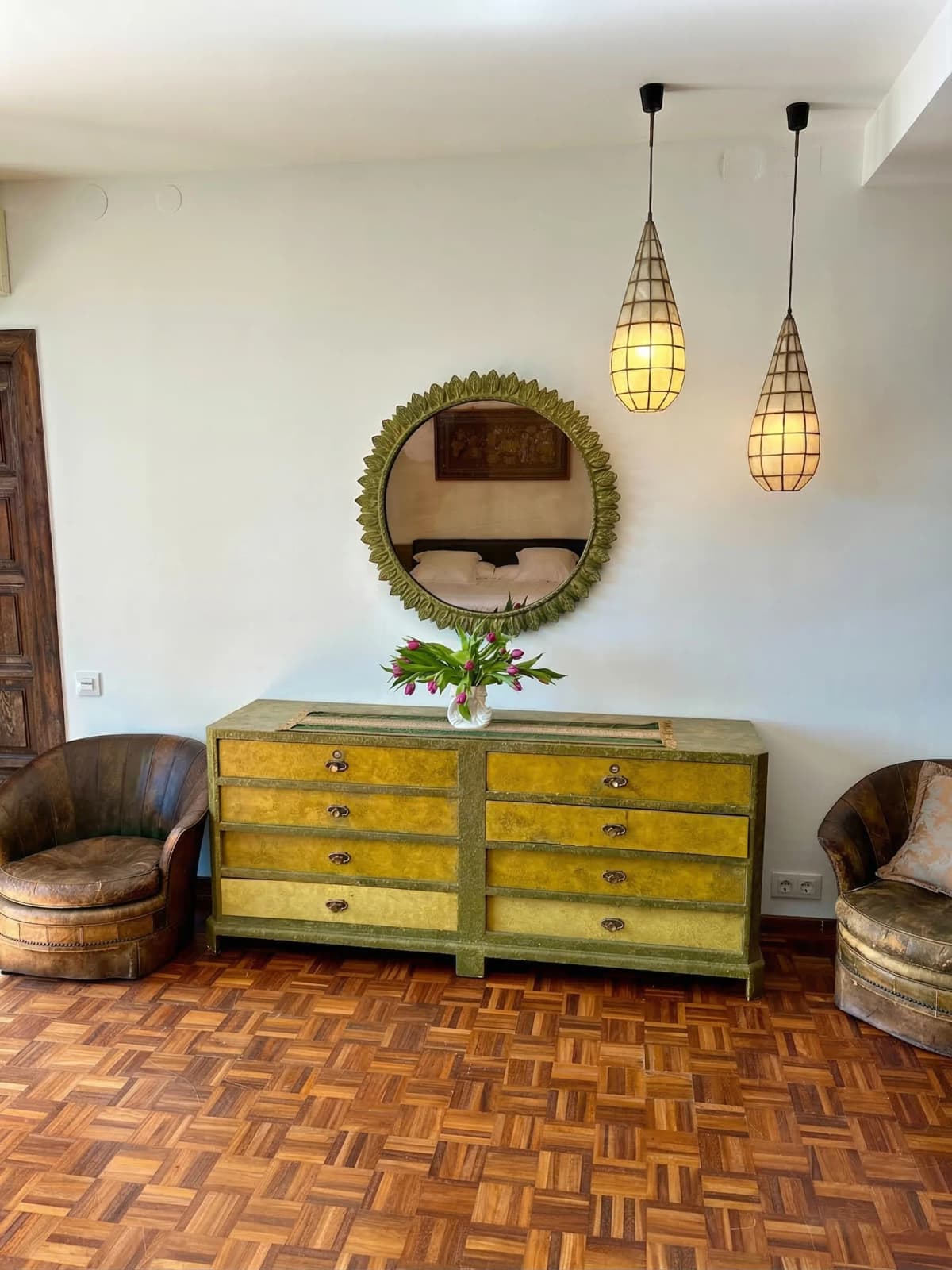 Vintage green dresser with round mirror