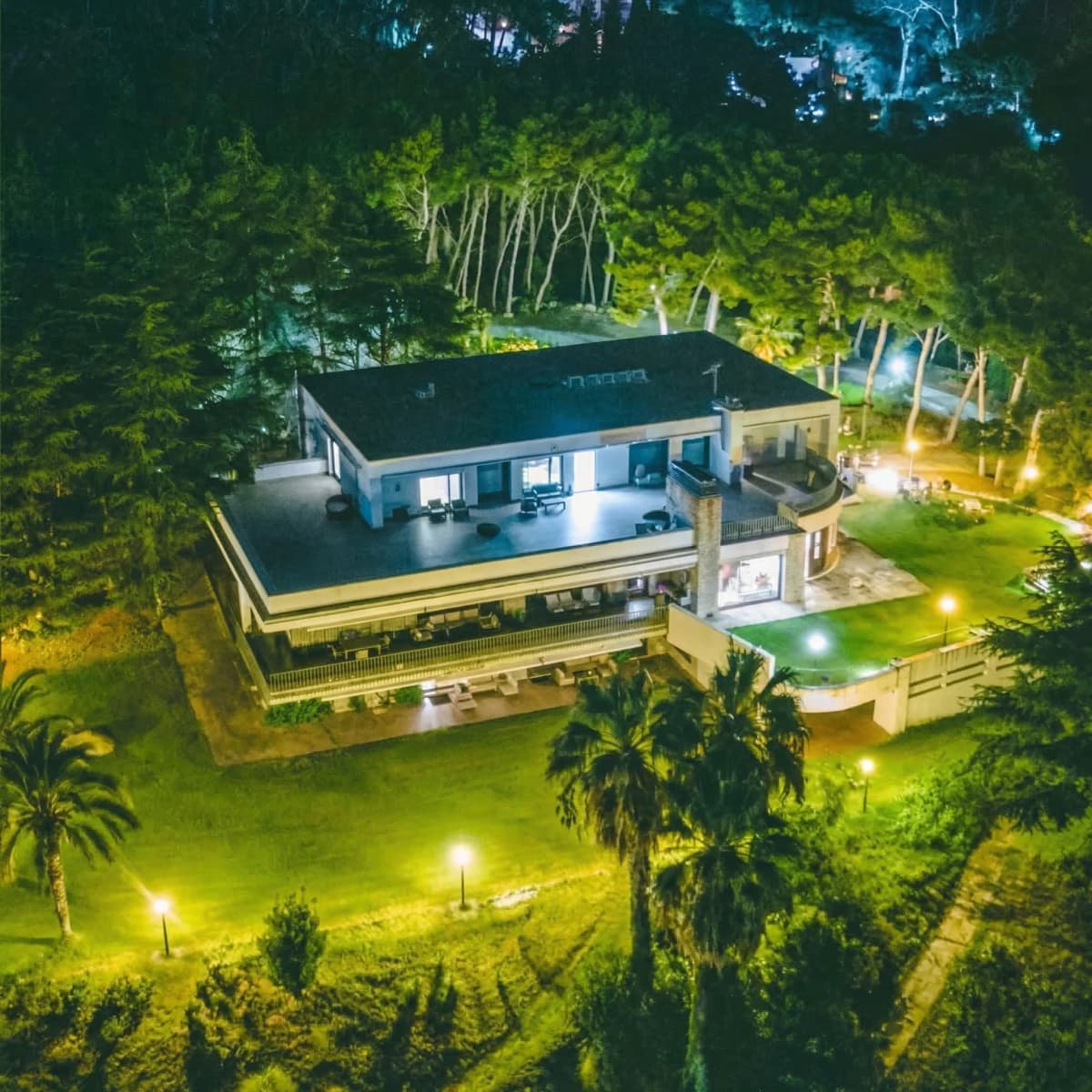 Aerial night view of the luxury villa